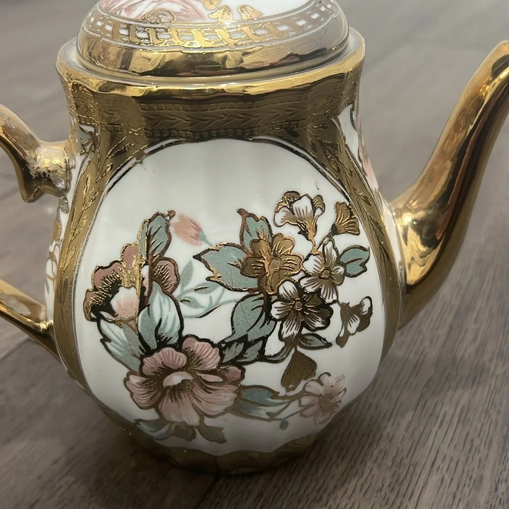Elegant glass decorative floral teapot